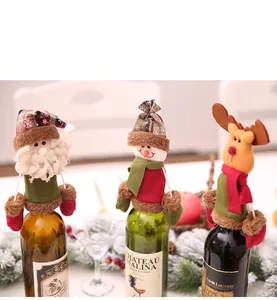 Close-up of festive Christmas wine bottle covers featuring Santa, Snowman and Reindeer motifs