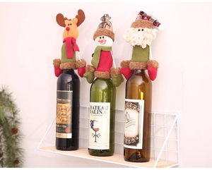 Detailed view of Christmas wine bottle covers featuring Reindeer, Snowman and Santa Claus