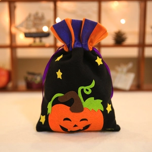 Halloween pumpkin drawstring gift bag made of black felt with orange stars and stripes