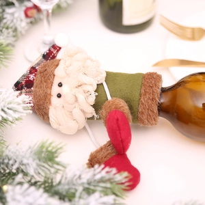 Charming Santa Claus knitted wine bottle cover for festive Christmas table decorations