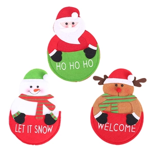 Three Christmas cutlery holders featuring Santa, Snowman, and Reindeer designs