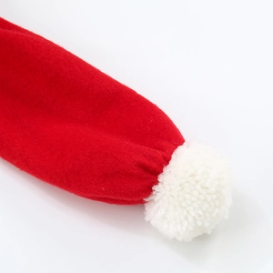 Classic red Christmas hat with white plush pom-pom and soft felt fabric texture