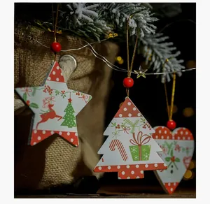 Detailed view of wood Christmas ornaments with stars, hearts, and trees in festive patterns