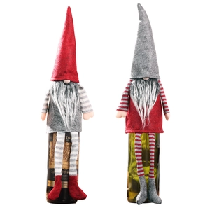 Christmas gnome wine bottle covers with striped long legs and festive forest elf hats