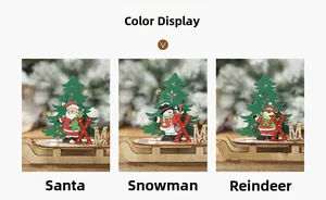 Drei Weihnachtsdekorationen aus Holz mit Weihnachtsmann, Schneemann und Rentier auf Schlitten