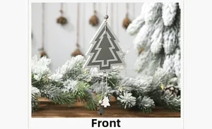Front view of hollowed-out wooden Christmas tree ornament with snowy pine needle background
