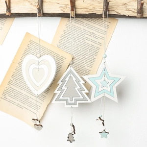 Three-piece hollow wooden Christmas ornaments set in heart, tree, and star shapes