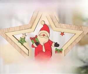 Detail of wooden star ornament with hollow Santa Claus carving and colorful tassels