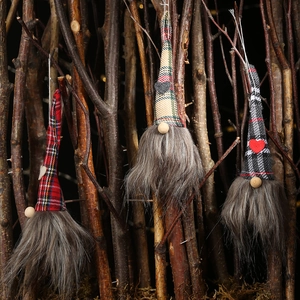Three Christmas gnomes with plaid hats and grey faux fur beards for holiday hanging decor