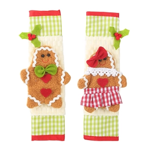 Christmas gingerbread themed microwave handle covers with red and green plaid patterns
