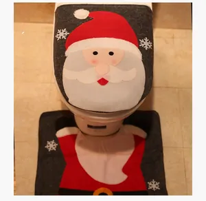 Detailed view of Santa Claus toilet cover and floor mat set for Christmas home decoration