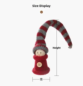 Detailed size chart showing height and width of a knitted Christmas elf decoration
