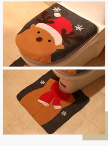 Vertical view of Christmas reindeer toilet lid cover and U-shaped floor mat set