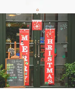 Close-up of Merry Christmas door banners and welcome hanging signs for holiday decoration