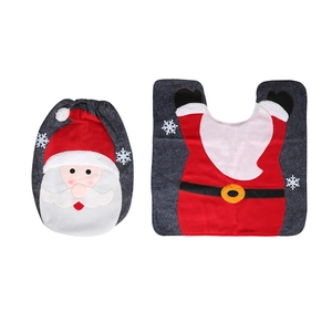 Christmas toilet seat cover and rug set with Santa Claus design for holiday bathroom decor