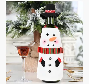 Close-up of snowman wine bottle cover with a black top hat and red scarf for Christmas
