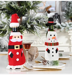 Festive Santa and snowman bottle aprons with hats for Christmas table decorations