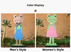 Detail van houten Pasen kikker figuren in schattige gestippelde outfits
