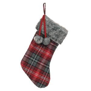Plaid Christmas stocking with grey faux fur trim and pom-poms on a white background