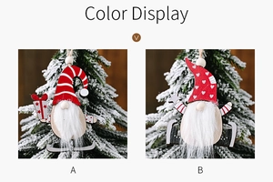 Detailed view of two Nordic wooden gnome ornaments with white faux fur beards on snow branches
