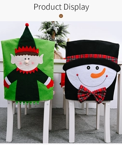 Detail of Christmas chair covers featuring festive elf and snowman holiday characters