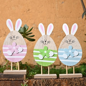 Three-piece set of wooden Easter bunny ornaments with stripes in pink, green, and blue