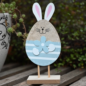 Handcrafted Easter bunny wooden ornament with egg-shaped body on a solid base