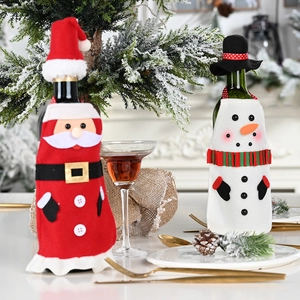 Christmas wine bottle covers featuring Santa Claus and Snowman felt designs with hats