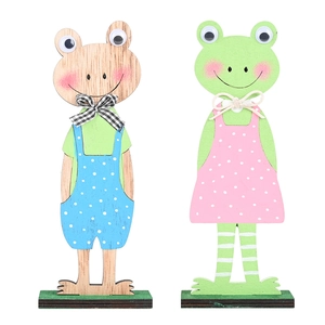 Noorse houten paaskikkerbeeldjes met stippenoutfits voor tafeldecoratie in huis