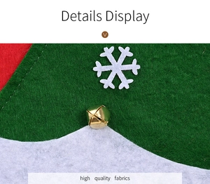 Macro detail of Christmas non-woven fabric with white snowflake and golden metal bell