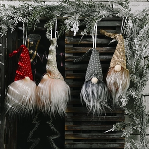 Lot de quatre gnomes de Noël festifs avec paillettes et bonnets à flocons de neige