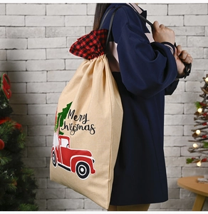 Linen Christmas gift bag with red truck print and Merry Christmas text decor