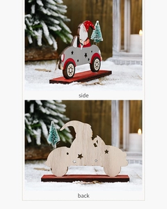 Detail of wooden Santa driving car ornament showing side and back view textures