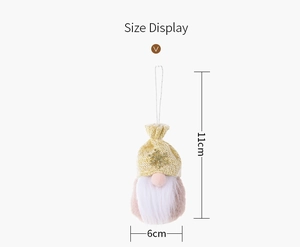 Detailed size display of a pink Christmas gnome with a golden sequin hat and white string