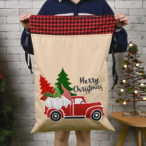 Linen Christmas gift bag with gnome driving truck and Merry Christmas print