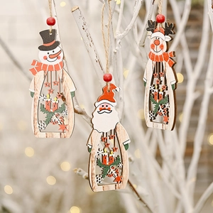 Detailed view of hollow wooden Christmas ornaments with Santa, snowman and reindeer