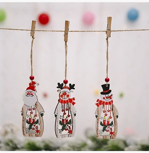Three Christmas wooden pendants featuring Santa, Reindeer, and Snowman with clips