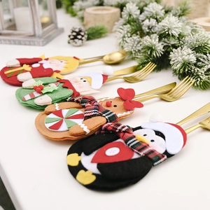 Christmas felt cutlery holders featuring gingerbread man and Santa Claus table decorations