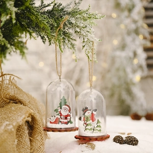 Christmas hanging ornament with wooden Santa Claus and snowman in transparent dome