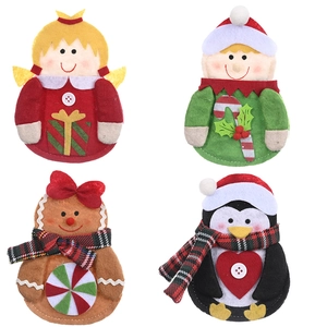 Set of four Christmas felt ornaments featuring angel, elf, gingerbread man and penguin
