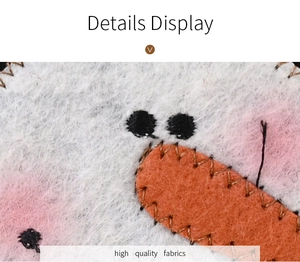 Macro view of high quality fabrics and handmade embroidery on a plush Christmas table runner