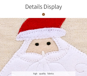 Détails du set de table de Noël en toile de jute avec une application du Père Noël en feutre