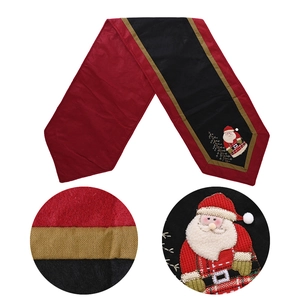 Christmas table runner with Santa Claus embroidery in red and black non-woven fabric