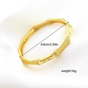 Detail view of 18K gold plated bamboo bangle with white zircon inlays and dimensions