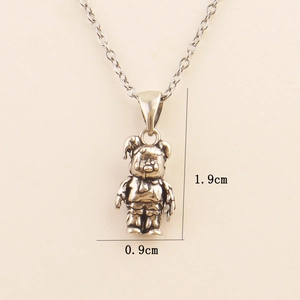 Detailed size view of retro cartoon bear pendant showing 1.9cm height and 0.9cm width