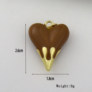 Brown enamel heart pendant with gold metal trim and dimensions of 2.6cm by 1.8cm