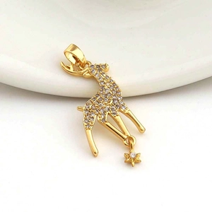 Detail of giraffe pendant with micro-paved zircons and a small gold star charm