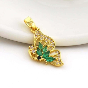 Elegant gold butterfly pendant with green marquise zircon inlay and hollow wings design