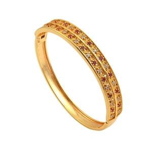 Luxury gold plated bangle with double rows of red and white cubic zirconia stones
