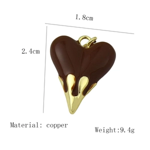 Detail of a brown enamel heart pendant with golden liquid effect and copper material info